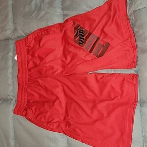 Puma brand shorts in red. Size14-16.